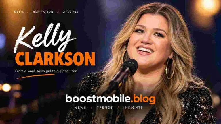 Kelly Clarkson performing on stage with boostmobile.blog branding