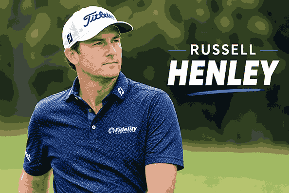 Russell Henley professional golfer wearing a navy golf shirt and white cap
